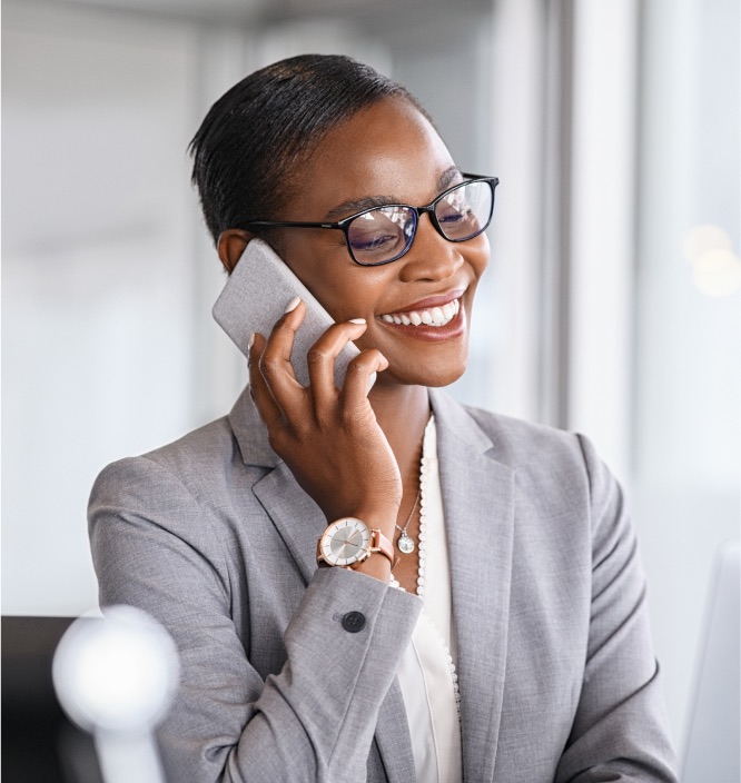 sales management headhunter working sales management recruiter smiling while on her cellphone