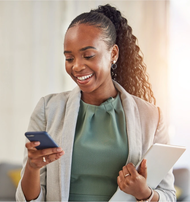 sales enablement recruiter smiling while on her cellphone