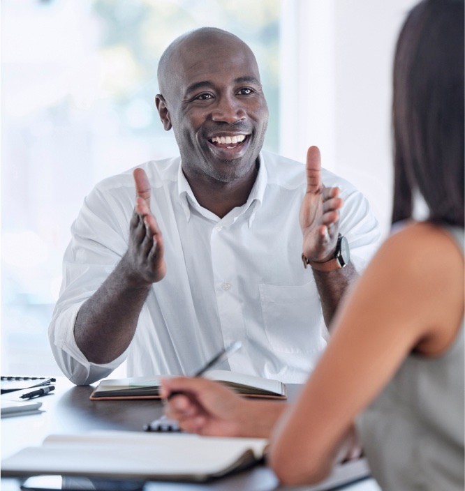 sales management recruiter smiling while on her cellphone