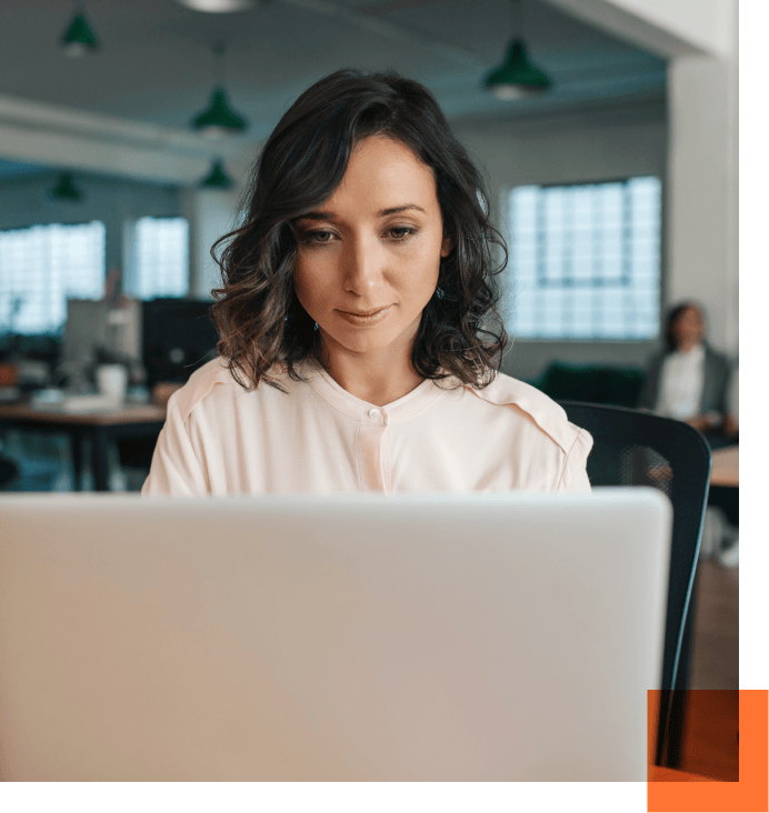 customer_service_staffing_agent female professional looking at computer