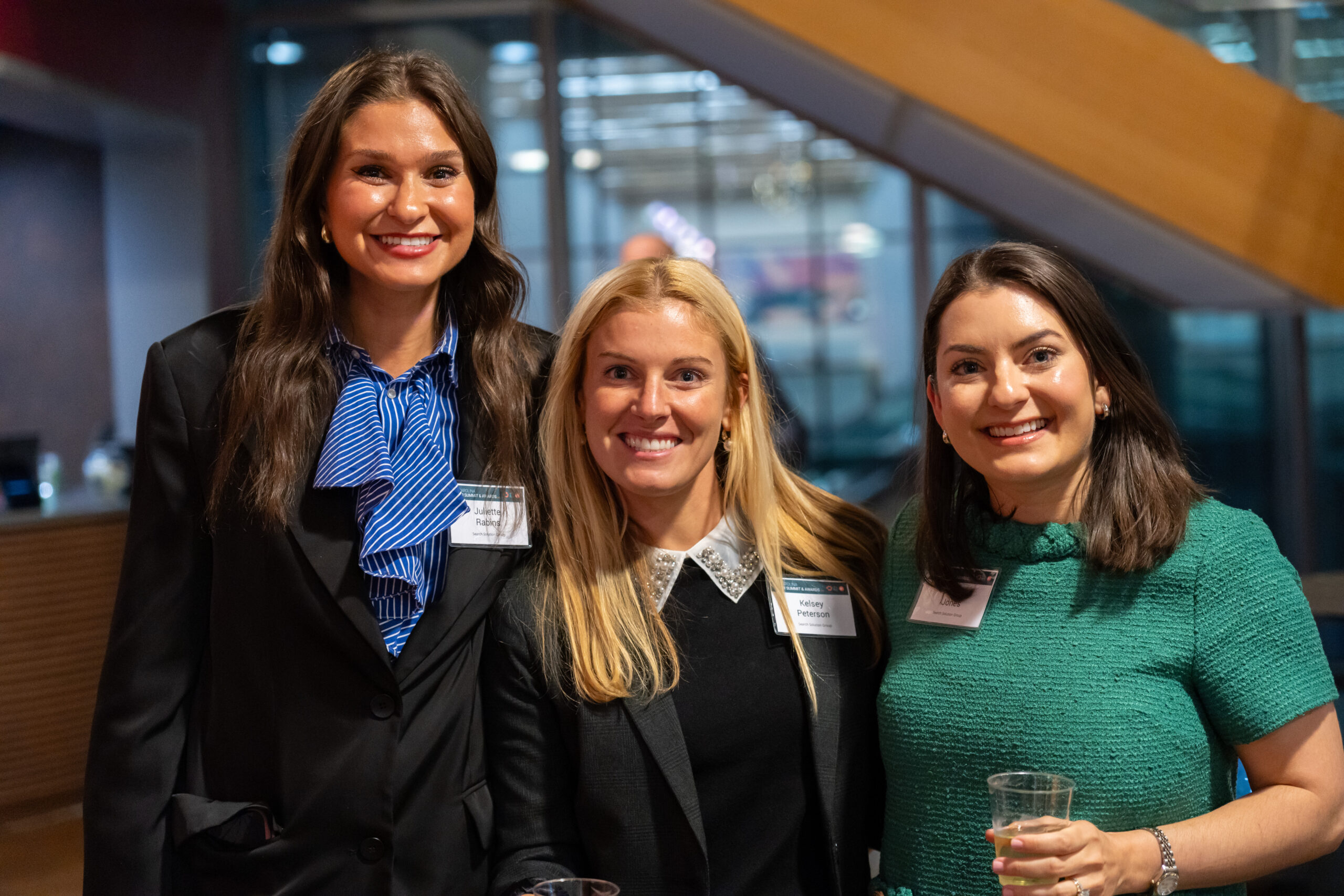 3 female SSG employees at HR event