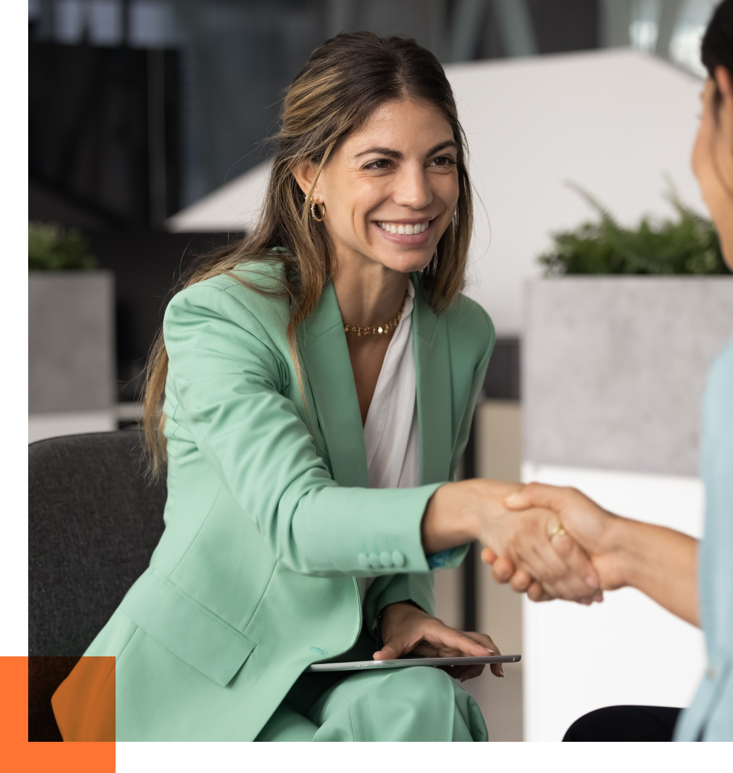 female cco shaking hands