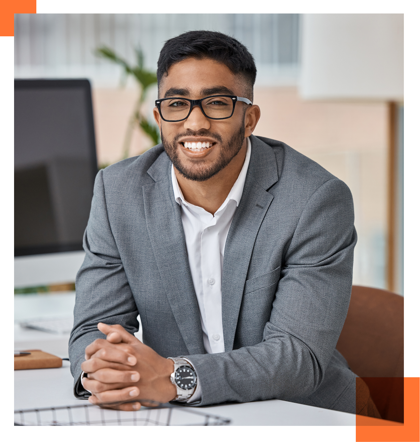 Male CMO sitting at desk