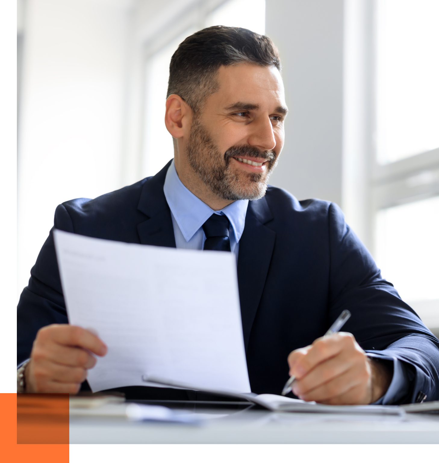 male CTO holding a paper
